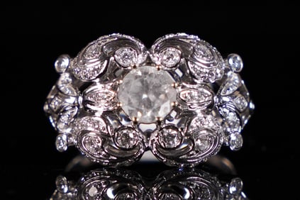 Platinum round diamond engagement ring