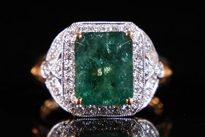 18 kt y/g emerald diamond ring