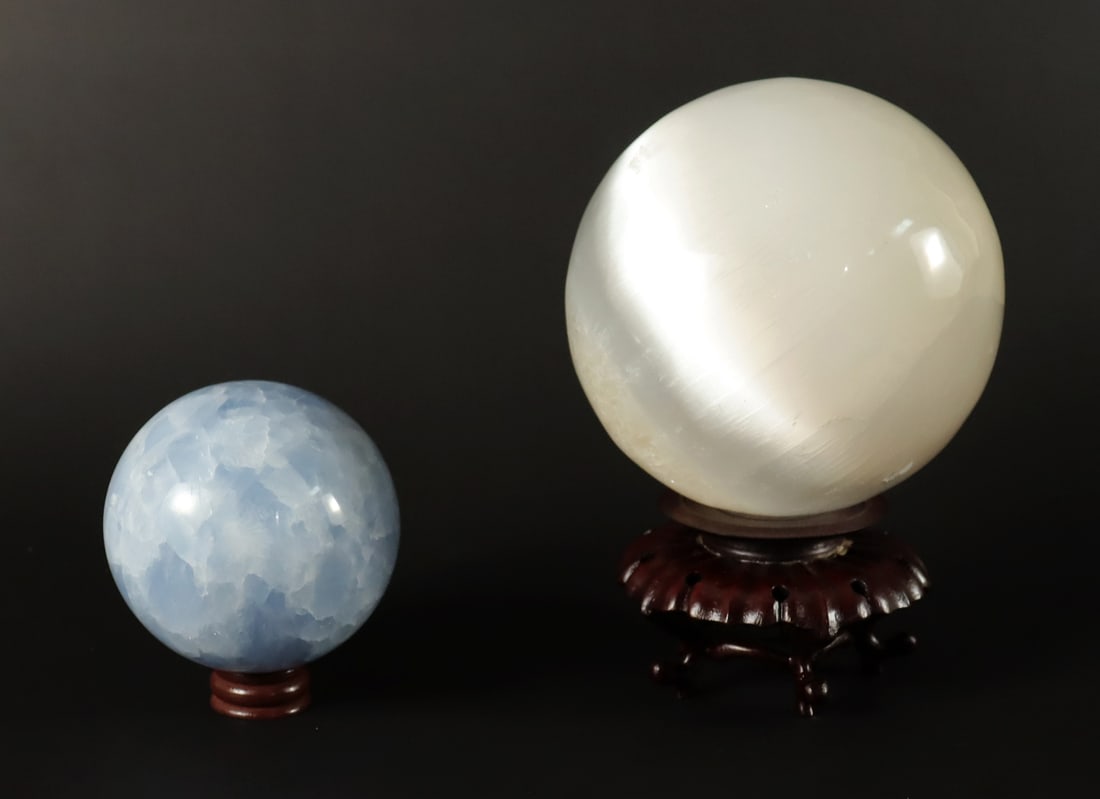 Lots carved balls: Lots carved balls, largest H: 5" x W: 5."