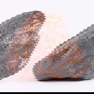 A possible meteorite boulder 21.6 lb: A possible heavy meteorite boulder, heavy in weight. Total 21.6 lb. H: 8" x W: 7.5."