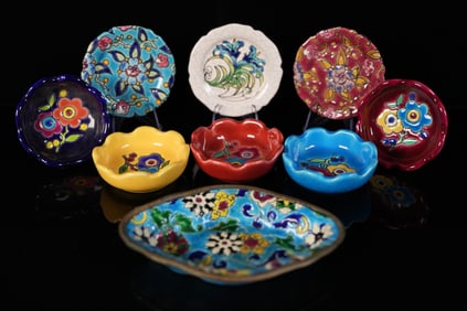 Lots of ceramic saucers