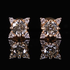 14 kt y/g diamond earrings