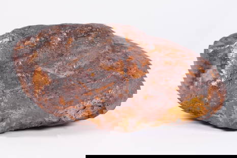 A possible meteorite boulder 9 lb: A possible meteorite boulder, heavy in weight. Total weight 9 lb. H: 3.5" x W: 8.5." Condition selling it as is, all sales are final.