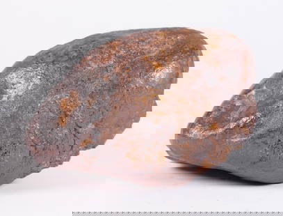 A possible meteorite boulder 13.2 lb: A possible meteorite boulder, heavy in weight. All sales are final. Total weight 13.2 lb. H: 4.5" x W: 7.5."