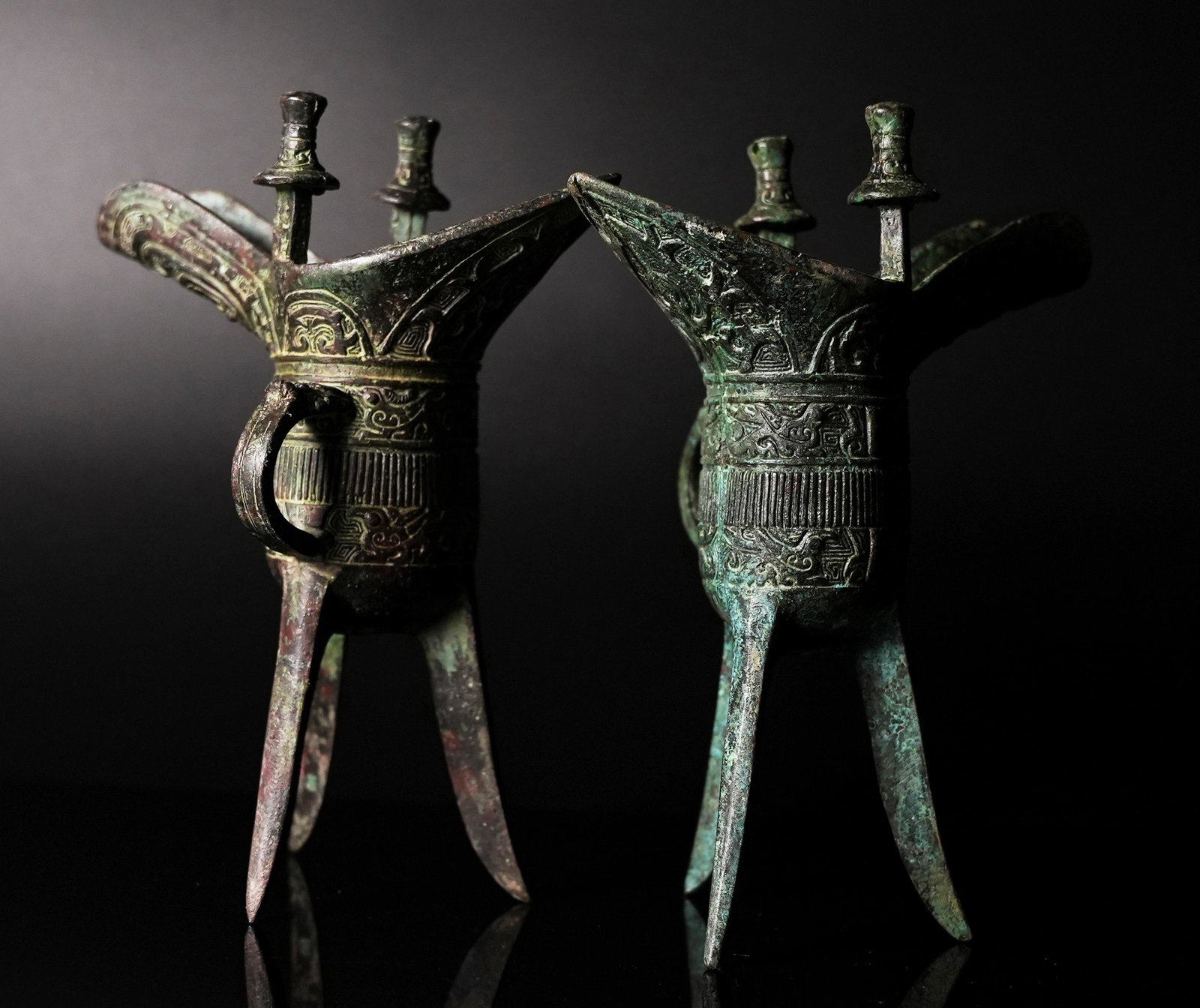 2 Chinese large bronze cups: 2 Chinese large bronze wine cups. H: 7.3" x W: 6.2."