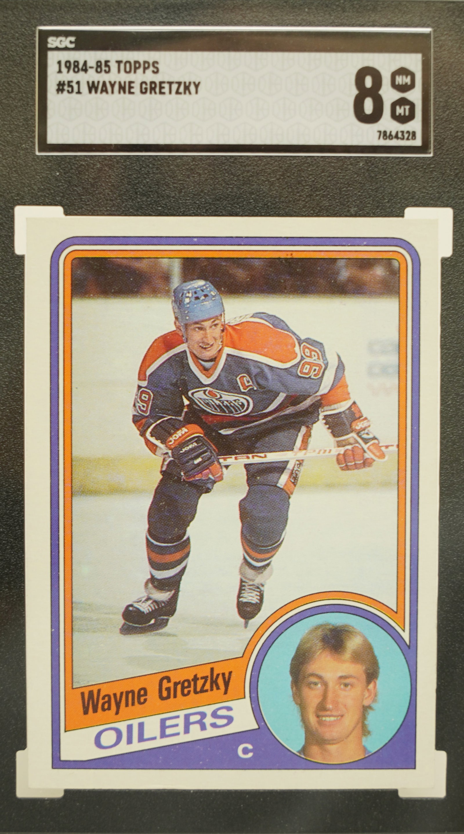 1984 Topps Wayne Gretzky SGC 8: 1984 Wayne Gretzky Topps graded SGC 8.