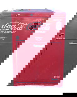 A vintage Coke vending machine: A vintage Coke vending machine. H: 36" x W: 24."