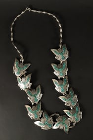 A vintage silver turquoise necklace