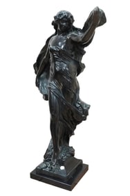 A signed bronze statue