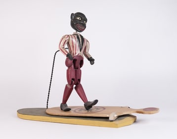 A vintage Black Americana metallic figure
