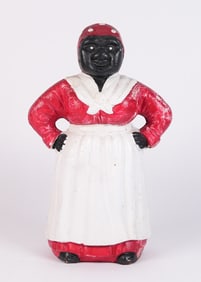 Antique Black Americana cast iron coin bank