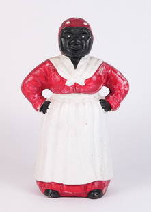 Antique Black Americana cast iron coin bank: Antique Black Americana cast iron large size coin bank. H: 11" x W: 7."