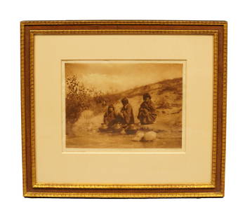 Gossiping Zuni Edward S. Curtis photogravure 1905: Gossiping Zuni by Edward S. Curtis. H: 24Sitting Elk by Edward S. Curtis. H: 24" x W: 27." Photogravure dated 1905.
