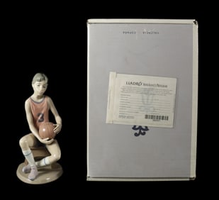 Lladro basketball boy withi box