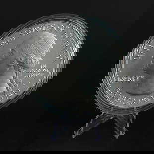 8 troy ounce .999 silver coin: 8 troy ounce .999 silver coin.