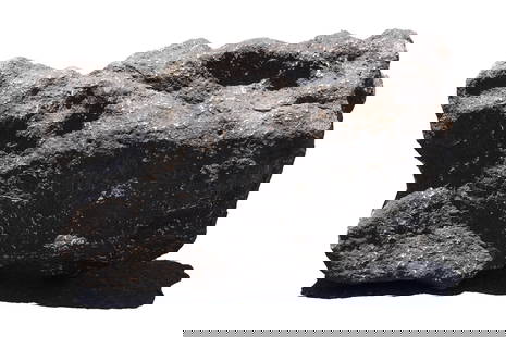 A possible meteorite large boulder: A possible meteorite large boulder, condition selling it as is. All sales are final. H: 13" x W: 12." Very heavy in weight. No return.