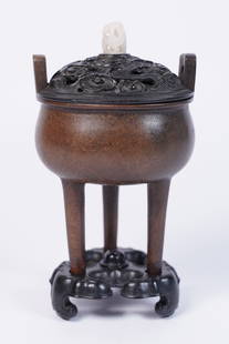 Chinese fine antique bronze censer: Chinese fine antique bronze censer with jade finial. From an estate. H: 8" x W: 4.5."