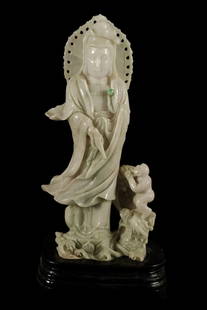 Chinese carved jadeite buddha statue: Chinese carved jadeite carved statue, buddha motif. H: 11" x W: 4.8."