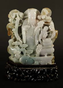 Chinese jadeite carved deity: Chinese fine jadeite carved deity figure. H: 8" x W: 6."