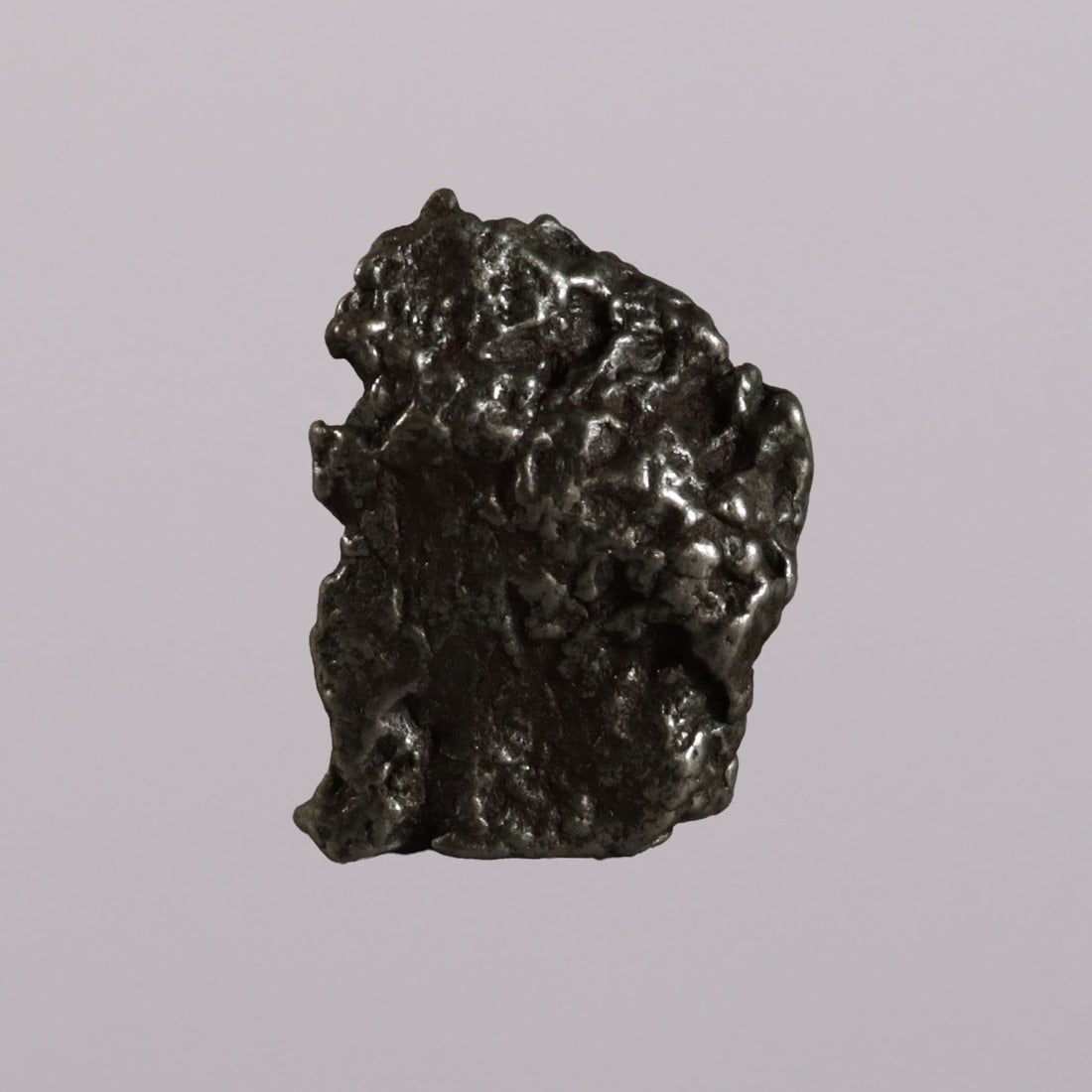 A meteorite with vintage box: A meteorite with vintage storage box.