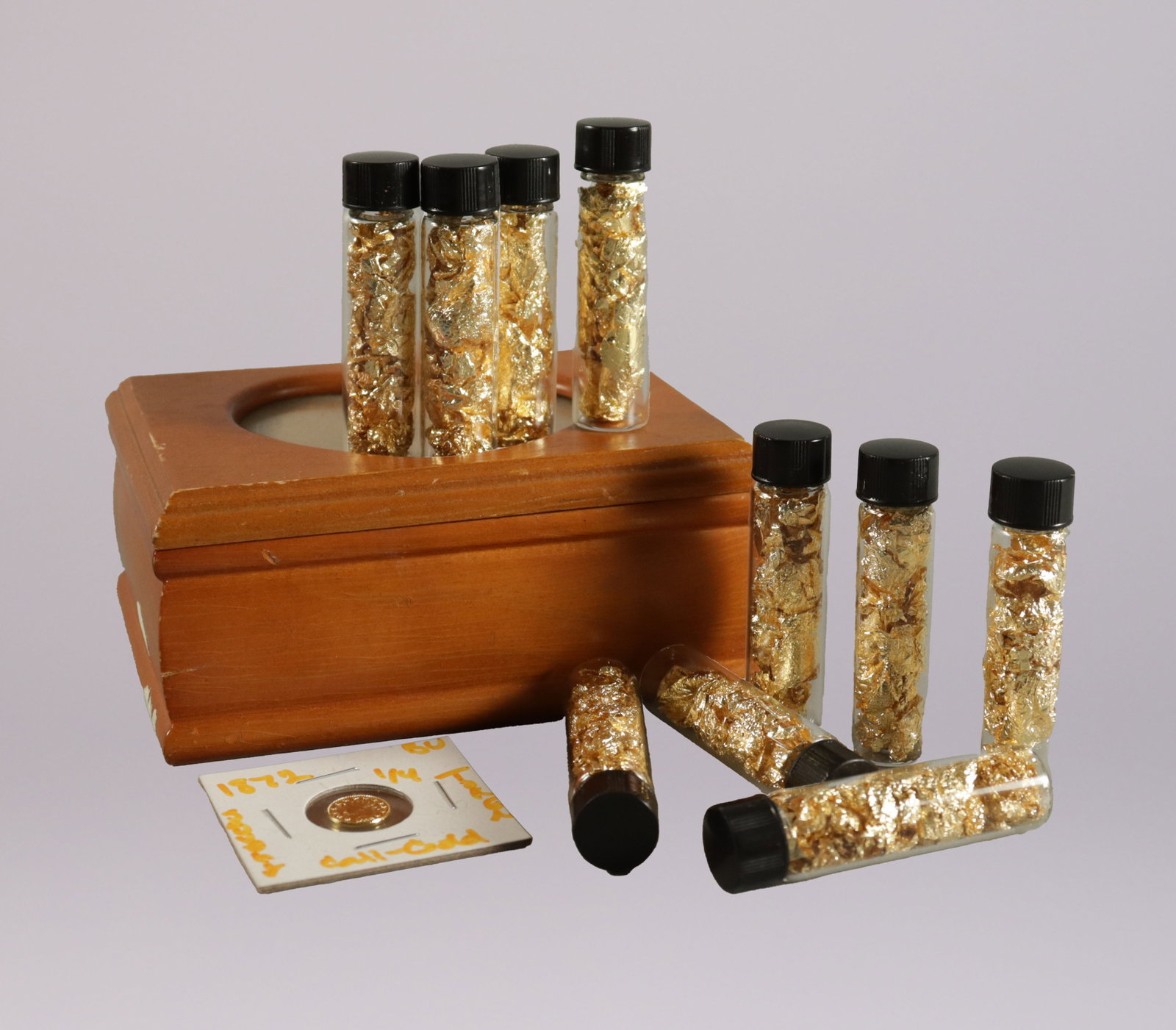 Lots gold flakes with coin: Lots gold flakes with coin, we do not guarantee coin authenticity. Coin is ungraded. All sales are final, no return.