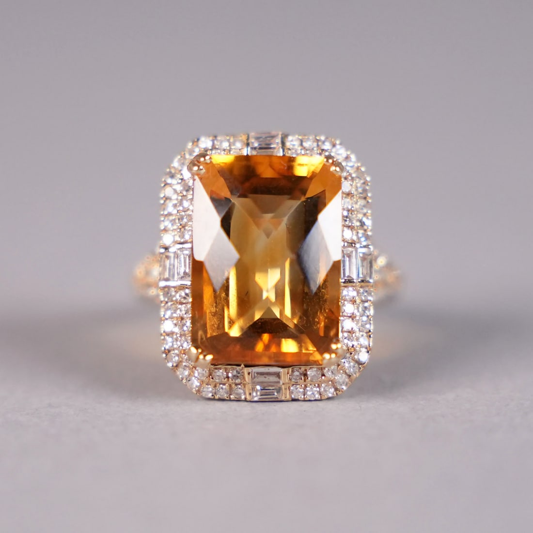 14 kt y/g Citrine diamond ring: 14 kt yellow gold 7.5 carat citrine quartz with diamond, total 0.60 carats. Total appraisal value $11,540. U.S. size 5.