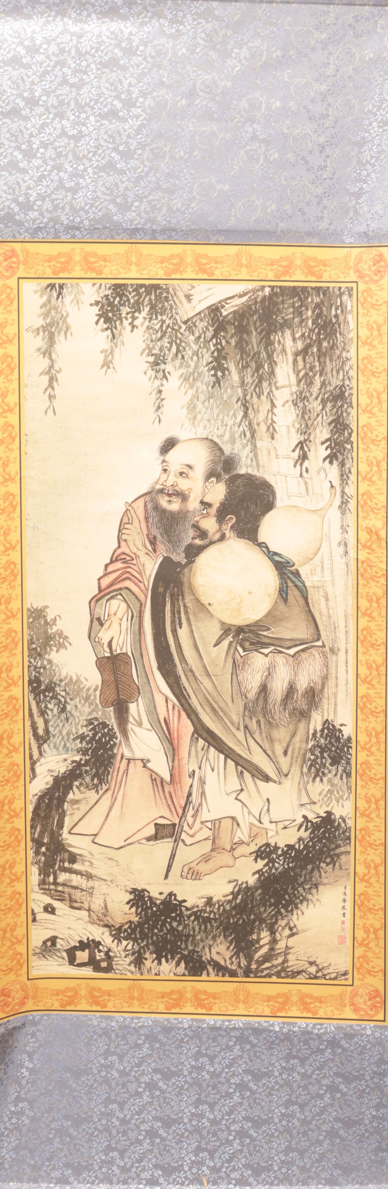 Chinese long scroll in box: Chinese long scroll in wooden box.