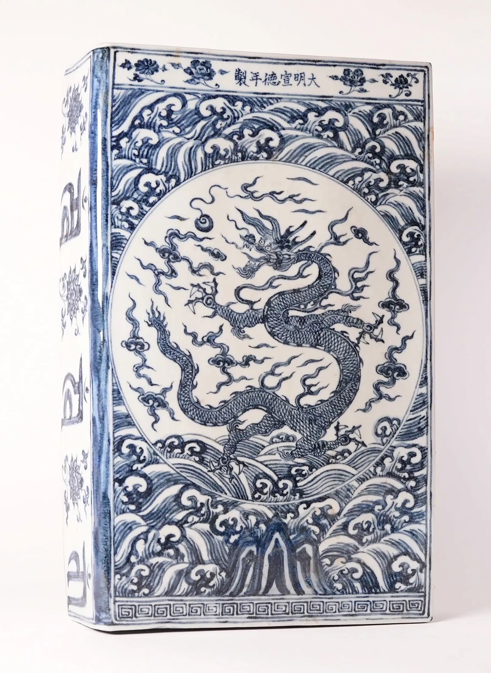 Chinese b/w porcelain block: Chinese fine b/w porcelain block. H: 14" x W: 9."