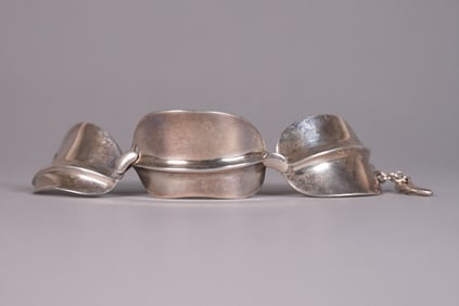 A vintage sterling bracelet signed modernist