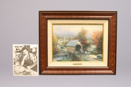 A vintage Thomas Kinkade framed painting