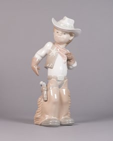 A Lladro cowboy figurine