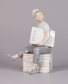 A Lladro boy figurine