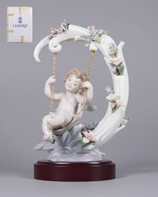 A rare Lladro heavenly swing figurine with box
