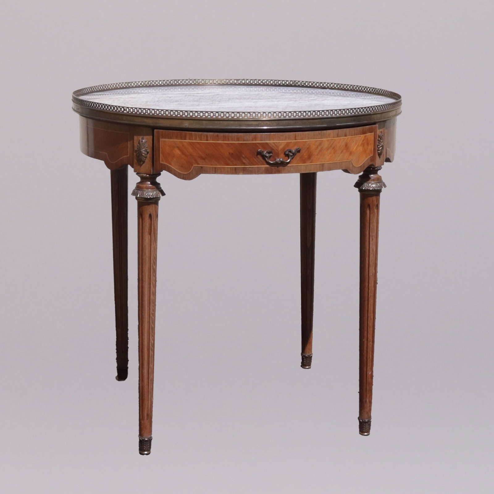 An antique side desk: An antique side desk, from an estate. H: 26" x W: 26.5."Can have a shipper pick up or pick up at our auction gallery locally.