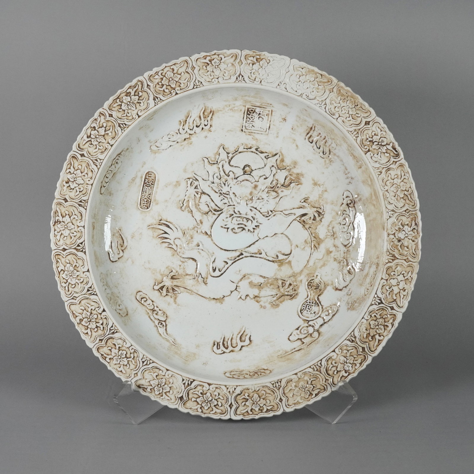 Chinese fine charger plate: Chinese fine white glaze charger plate. H: 3" x W: 16.75."