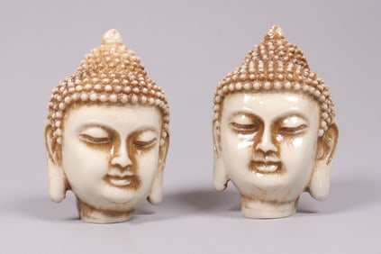 2 Chinese buddha heads