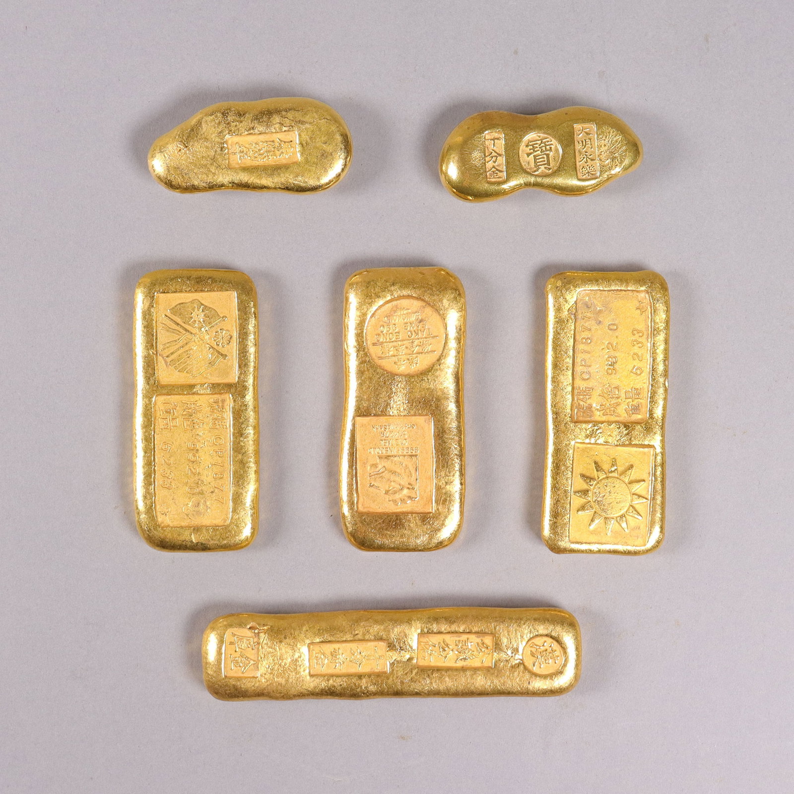 Lots Chinese ingots ungraded: Lots Chinese ingots ungraded, condition selling it as is. We do not guarantee any grading or markings. All sales are final, no return. Please read carefully before bidding.