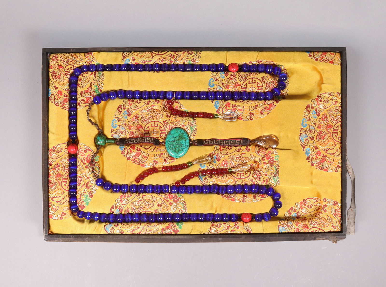 Chinese long beaded necklace: Chinese long beaded necklace in box.