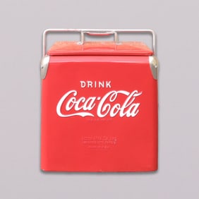 A vintage Coca Cola cooler