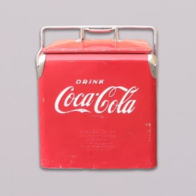 A vintage Coca Cola cooler