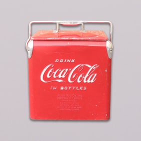 A vintage Coca Cola cooler
