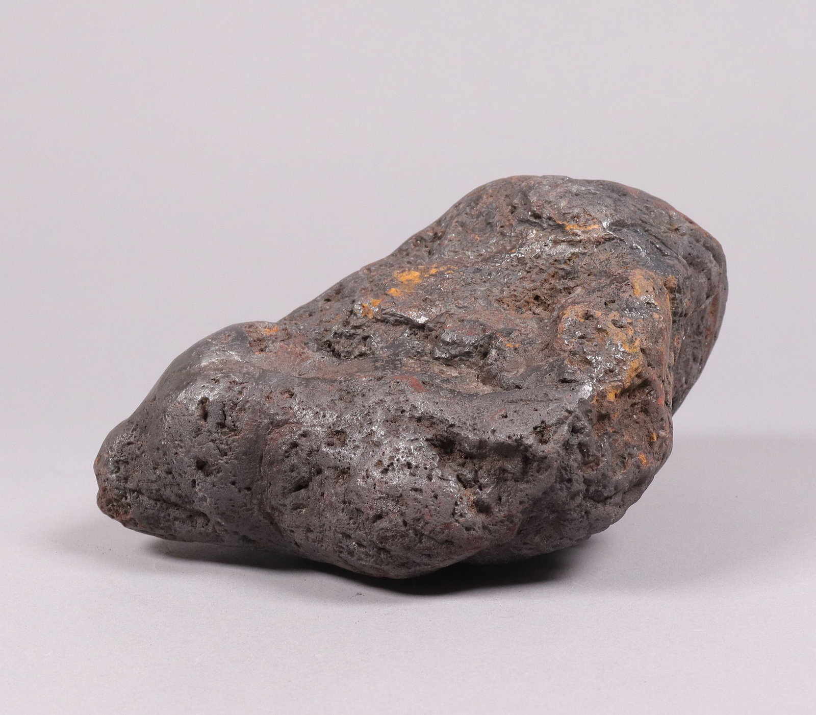A possible meteorite boulder: A possible meteorite boulder, condition selling it as is. All sales are final. No return. H: 3.25" x W: 8." Total 9.9 weight lb.