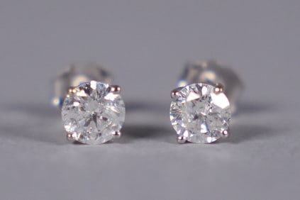 Pair 14 kt white gold diamond earrings