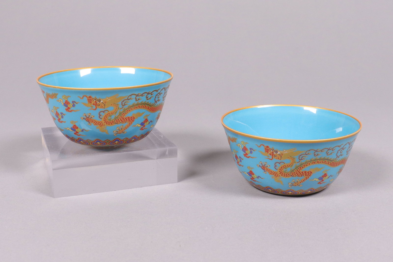 2 Chinese fancy cups: 2 Chinese fancy cups. H: 1.5" x W: 3.25."
