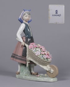 Lladro girl figure with flower