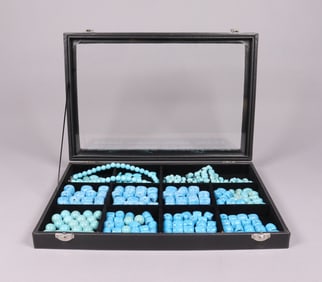 Lots turquoise beads in box