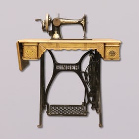 Antique Singer sewing machine with table