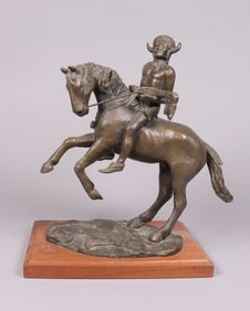 A dated 1976 bronze sculpture