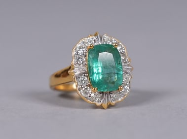 14 kt gold emerald diamond ring