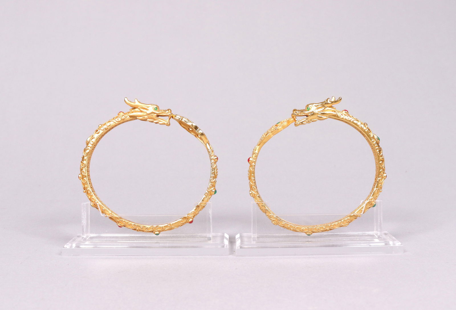 2 Chinese gilted bangles: 2 Chinese fine gilted bangles.